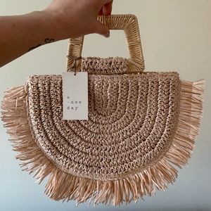 Blush woven handbag
